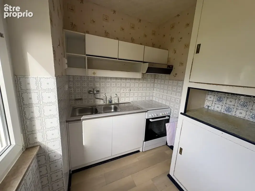 Maison mitoyenne avec jardin et garage. - photo 6
