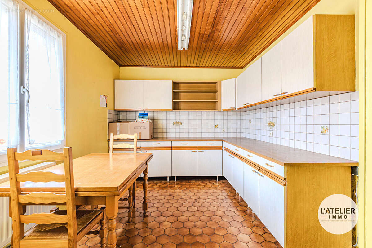 Maison de plain-pied avec double garage et jardin - photo 5
