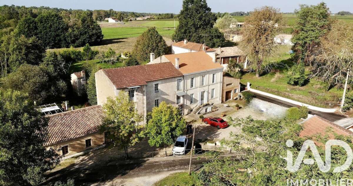 Photo 4 - Maison à REIGNAC