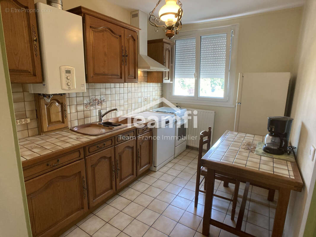 photo améliorée par IA - Appartement à BOURGES