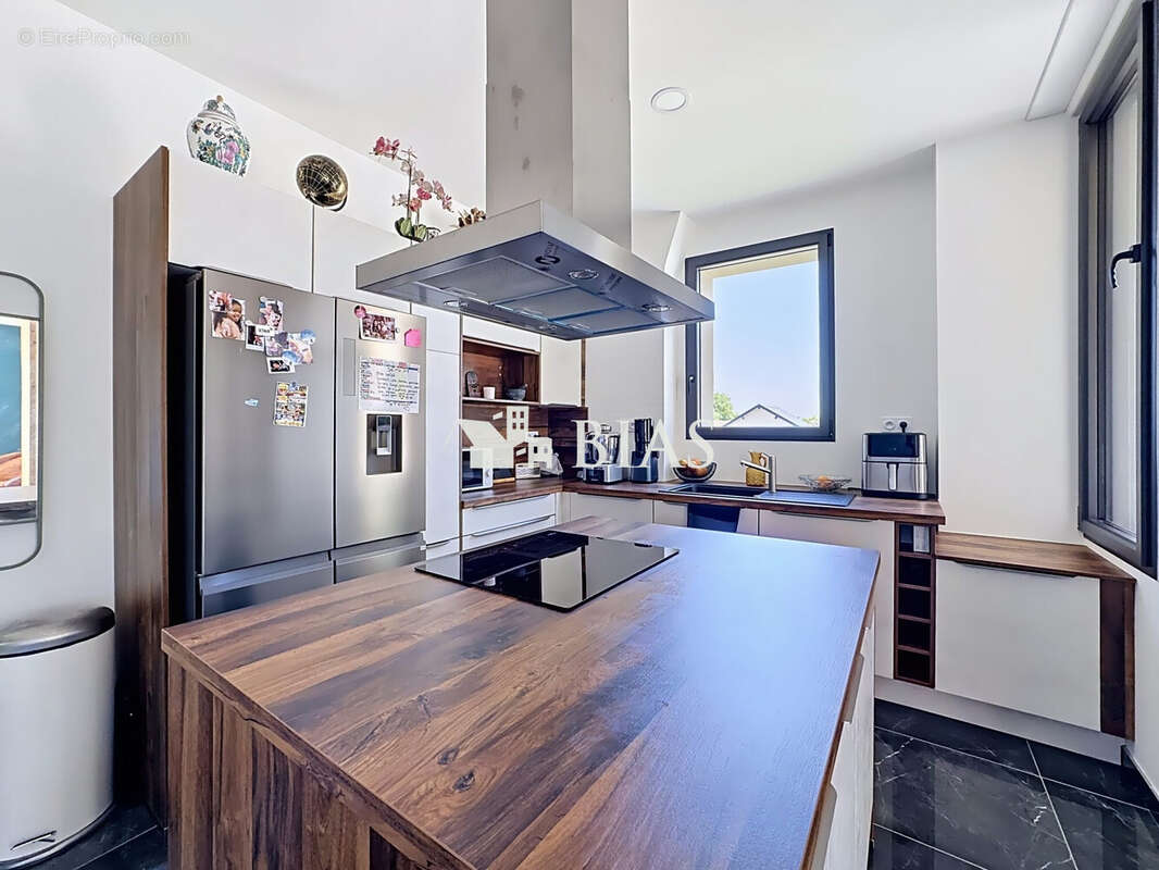 Maison 138 m² à Bourg-Achard  - photo 8