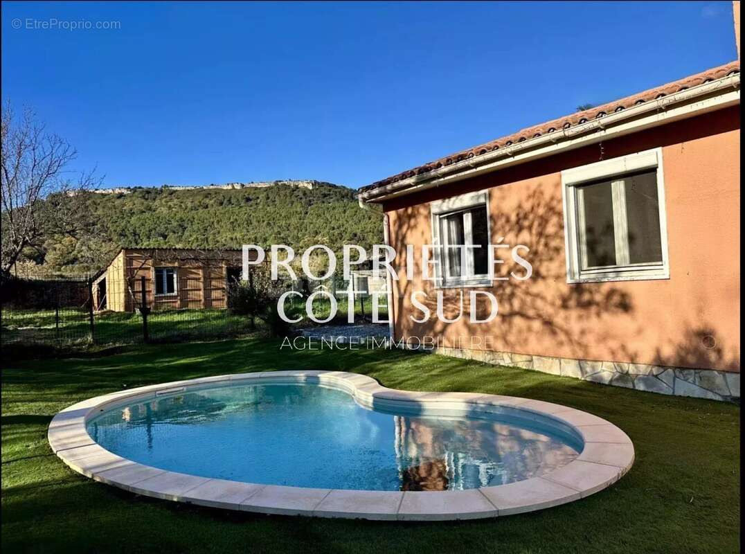 Maison à LAUDUN-L'ARDOISE