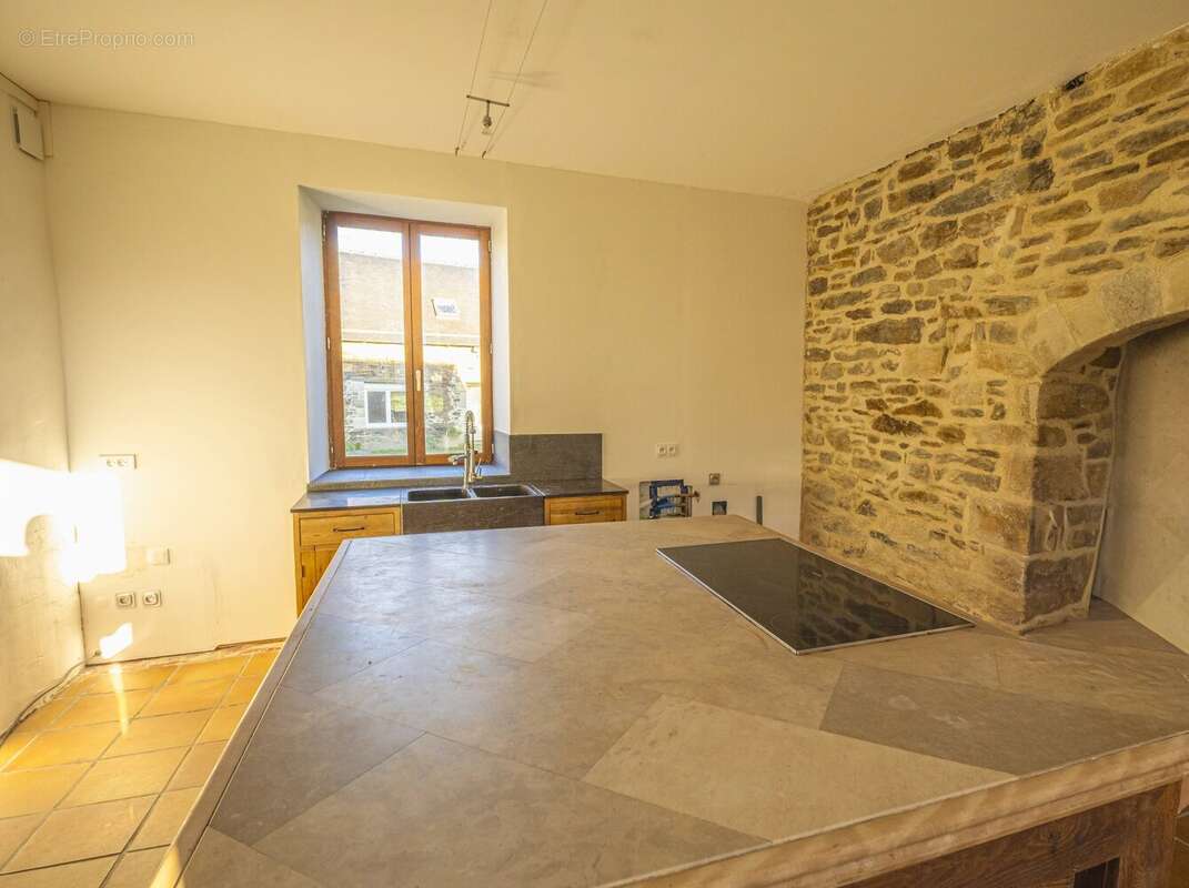 Maison à HENANBIHEN