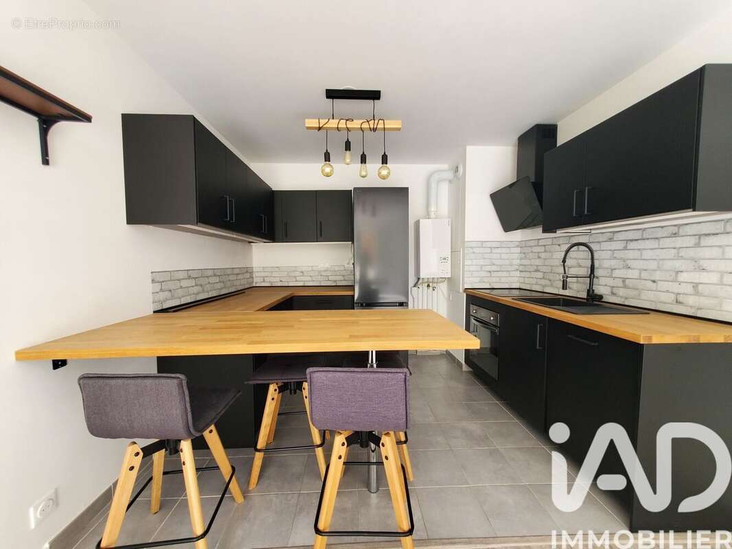 Photo 5 - Appartement à VOISINS-LE-BRETONNEUX