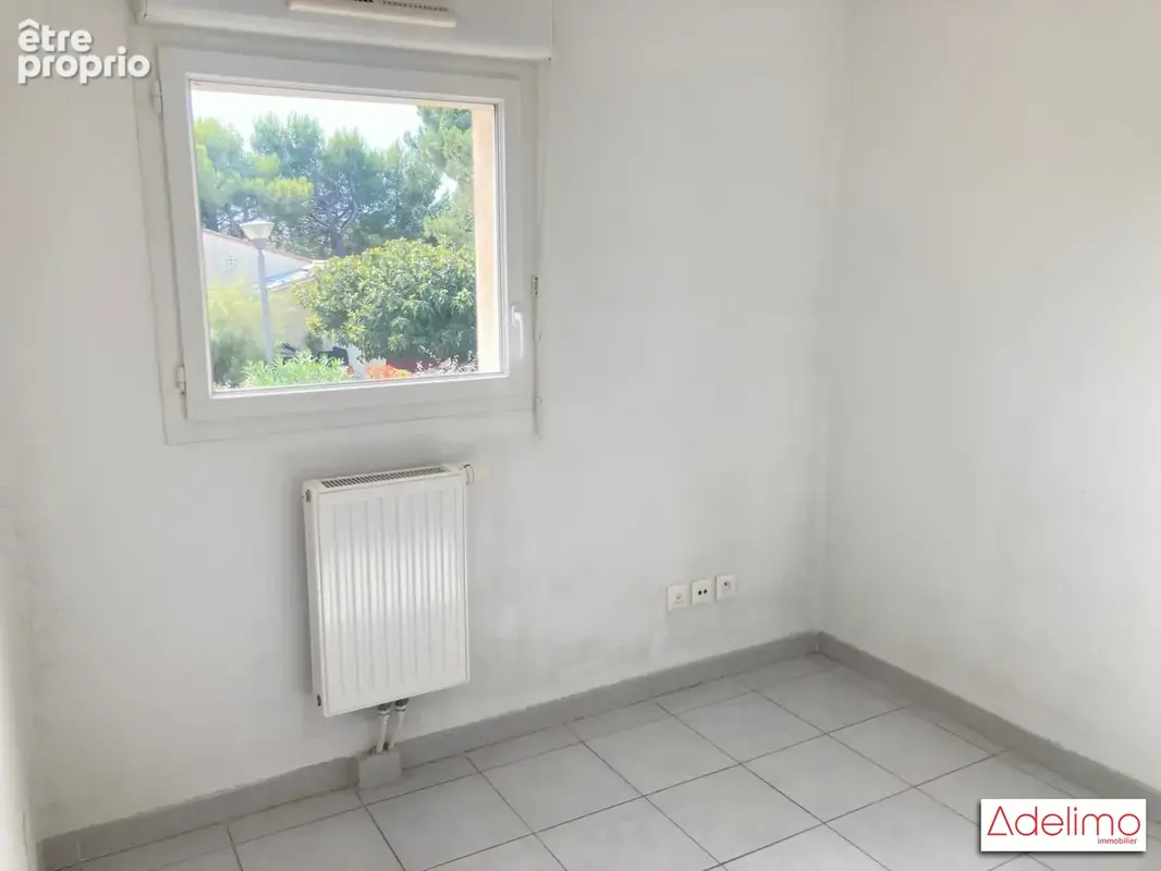 Appartement 3 pièces 57 m² à vendre à Garons (30128) - photo 4
