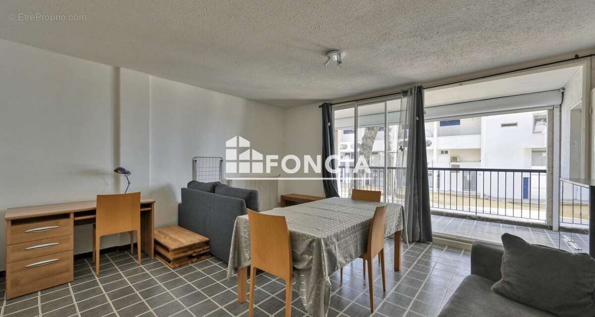 CENTRE VILLE - T2 de 52m2 avec sa loggia de 10m2 - photo 4