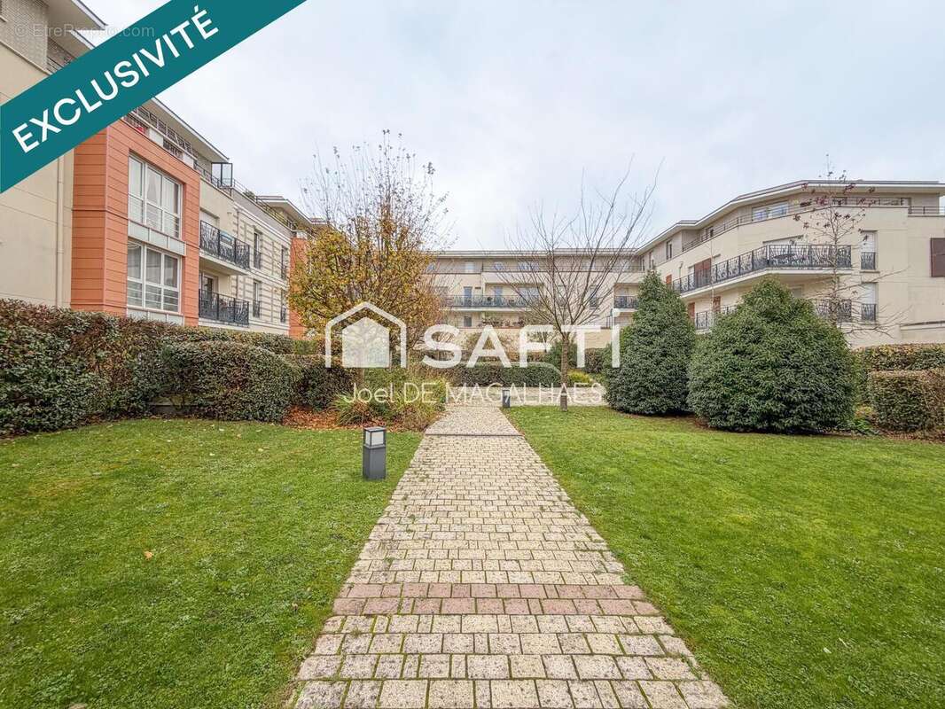 Photo 2 - Appartement à VOISINS-LE-BRETONNEUX