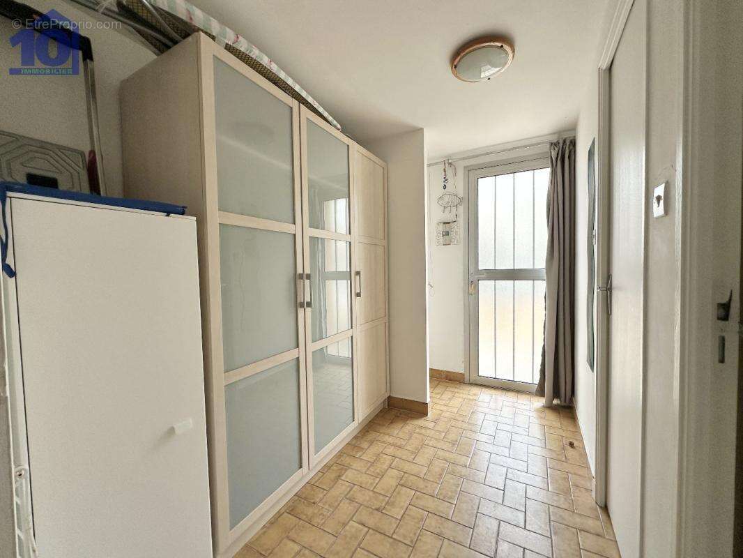 Appartement en rez-de-jardin - photo 7