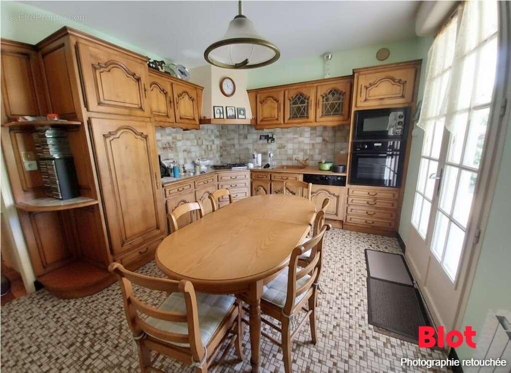 Maison 134 m² à Saint-Ouen-Des-Toits  - photo 3