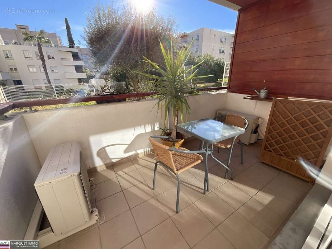 Agréable appartement T3 offrant 51 m² avec terrasse de 6 m² en rez-de-jardin d'une résidence sécurisé avec des espaces verts des - photo 9