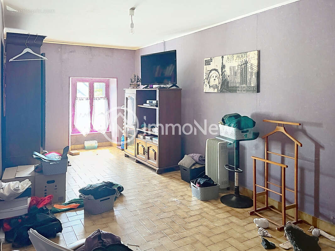 Maison en pierre 110 m2   Terrain 1 025 m2   SAINT-MICHEL-DES-LOUPS (50610) - photo 6