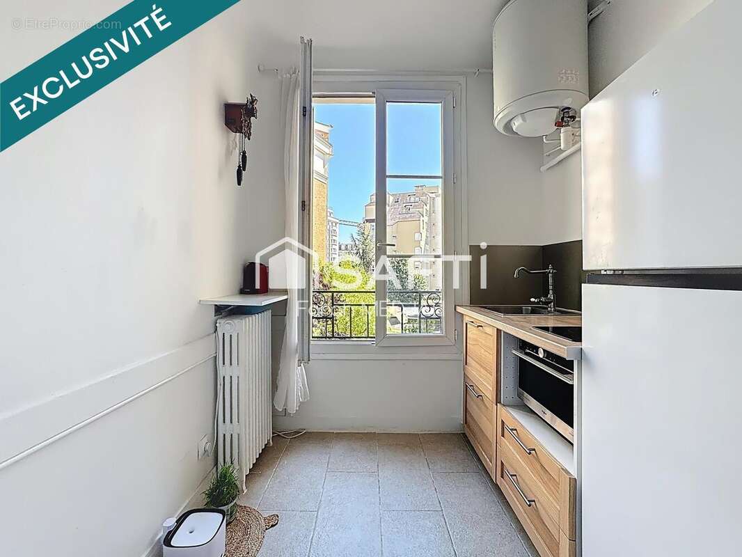 Photo 4 - Appartement à COURBEVOIE