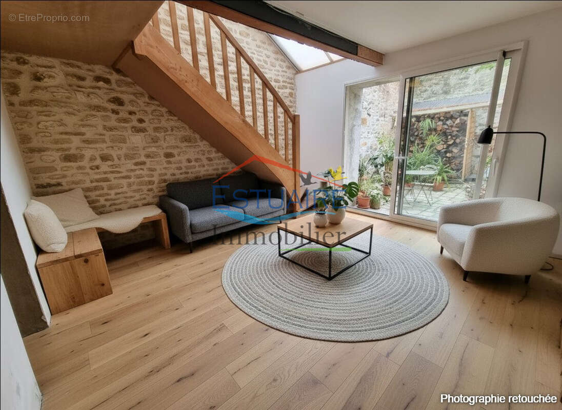 Maison 55 m² à Saint-Etienne-De-Montluc  - photo 2