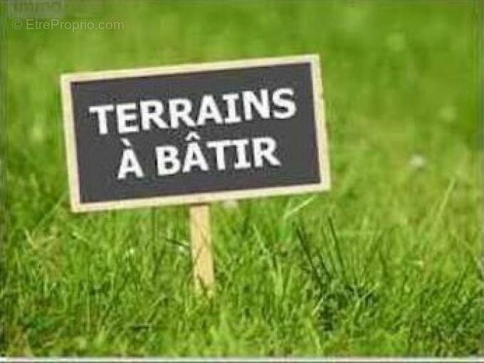 Terrain à CHARGE
