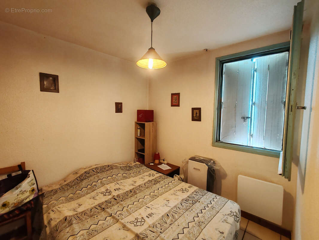 Appartement  de type 2 en rez de jardin - photo 5