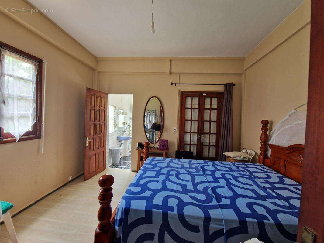 Appartement  4 pièce(s) 117 m2 , 3  chambres, rez-de-chaussée, grande terrasse, Gourbeyre - photo 8
