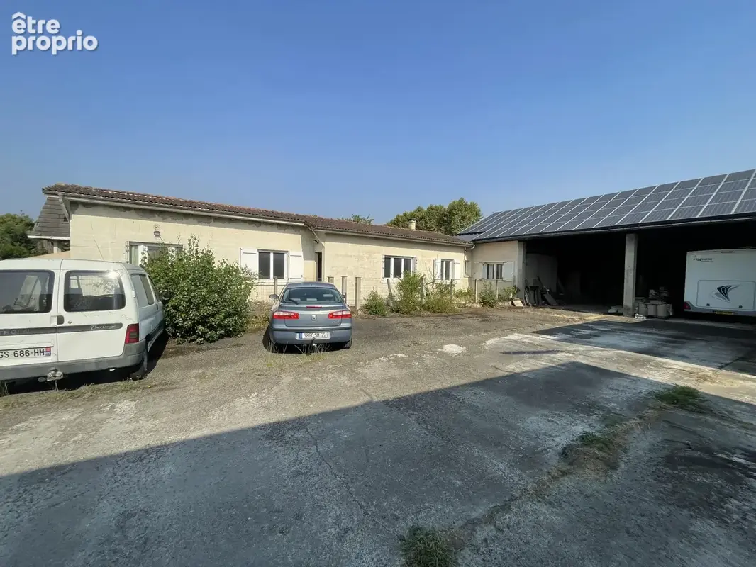 Ensemble immobilier avec deux maisons, un entrepôt et terrain constructible - photo 8