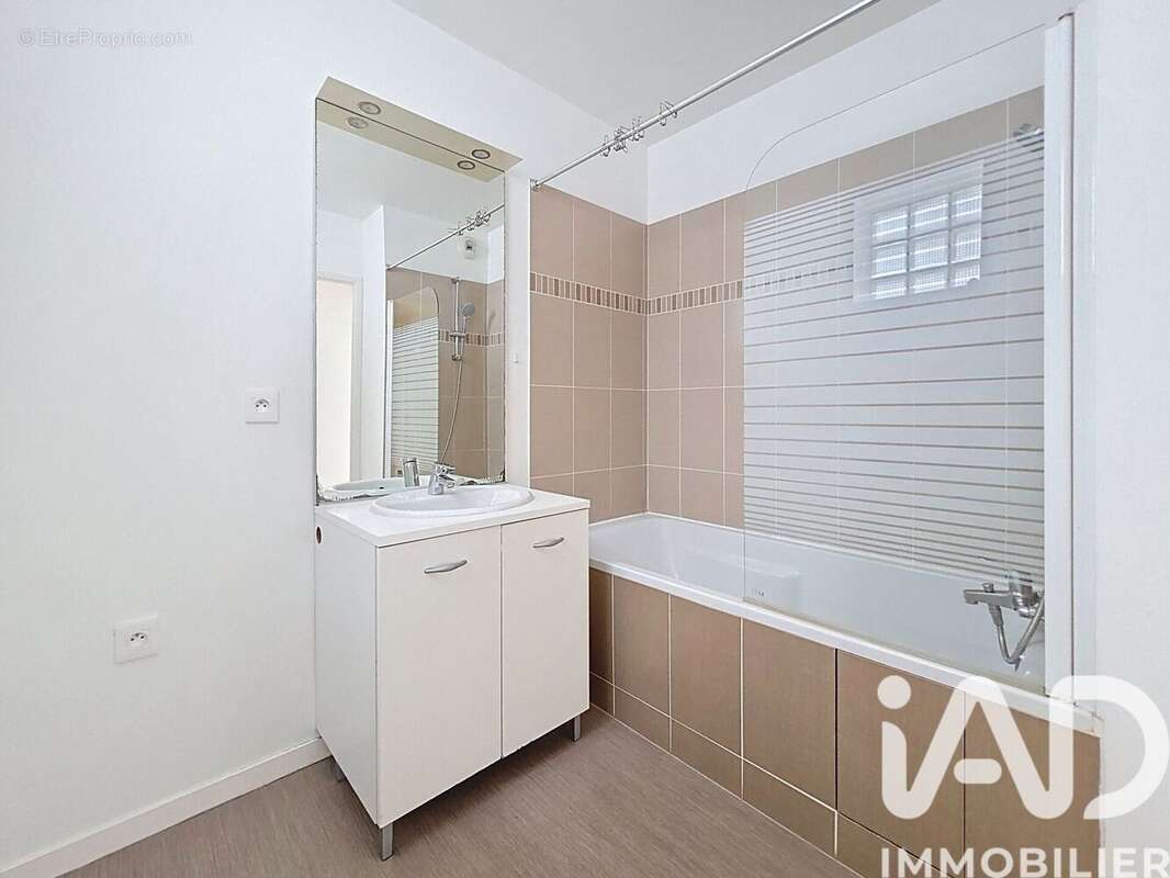 Photo 8 - Appartement à SAINTE-GENEVIEVE-DES-BOIS