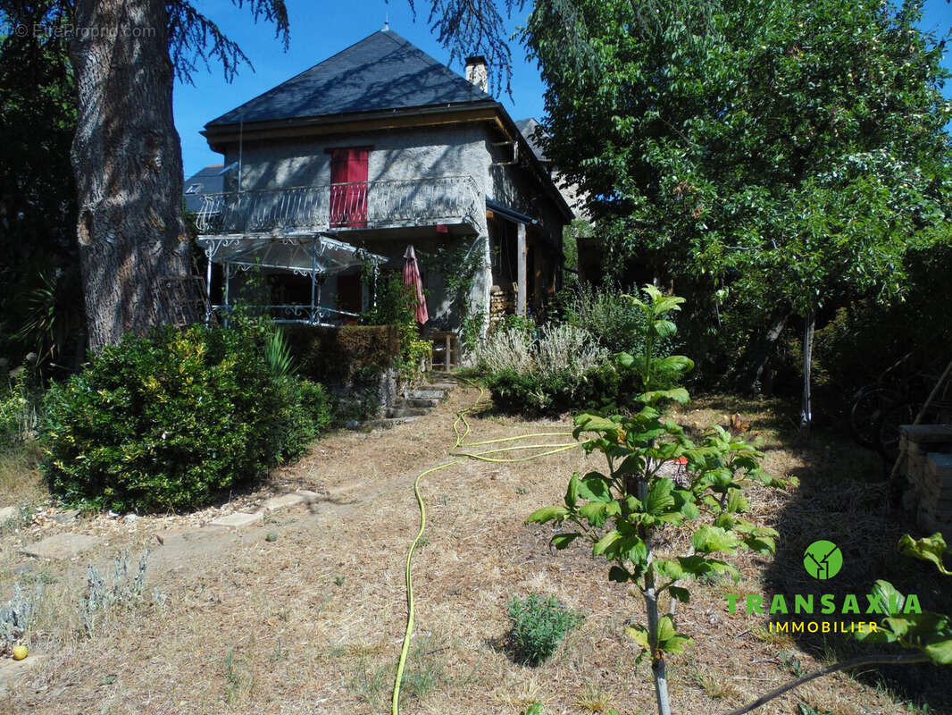 côté jardin - Maison à AUGIREIN
