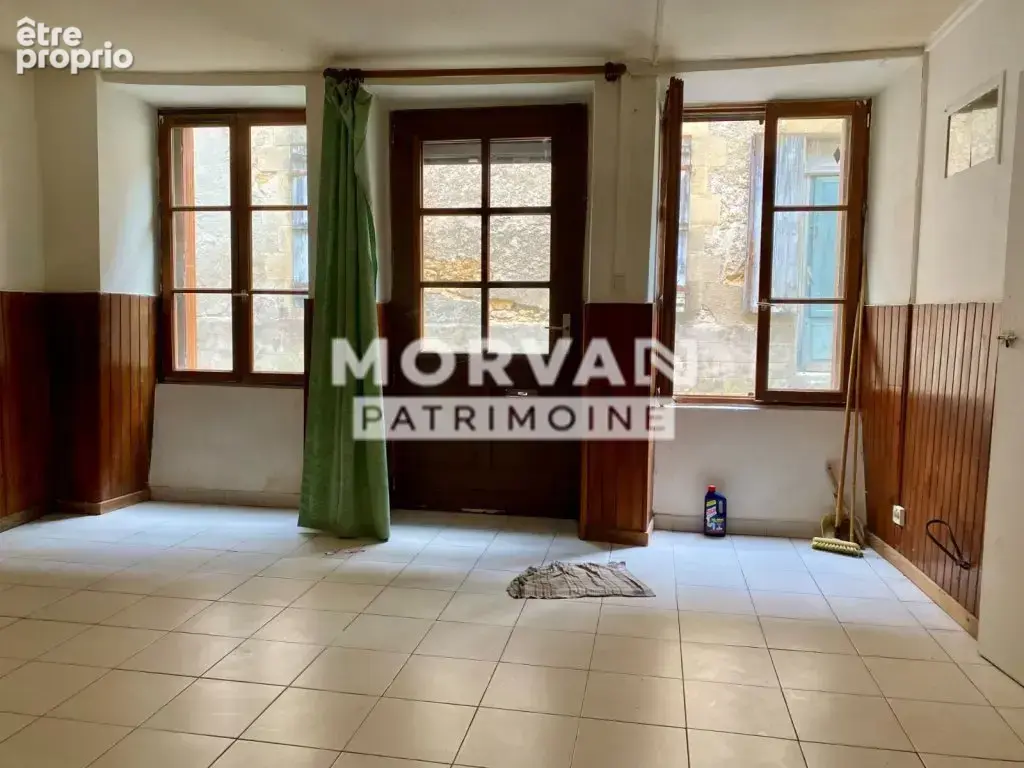Maison mitoyenne 60.53 m2 - coeur village tous commerces 29000 € - photo 2