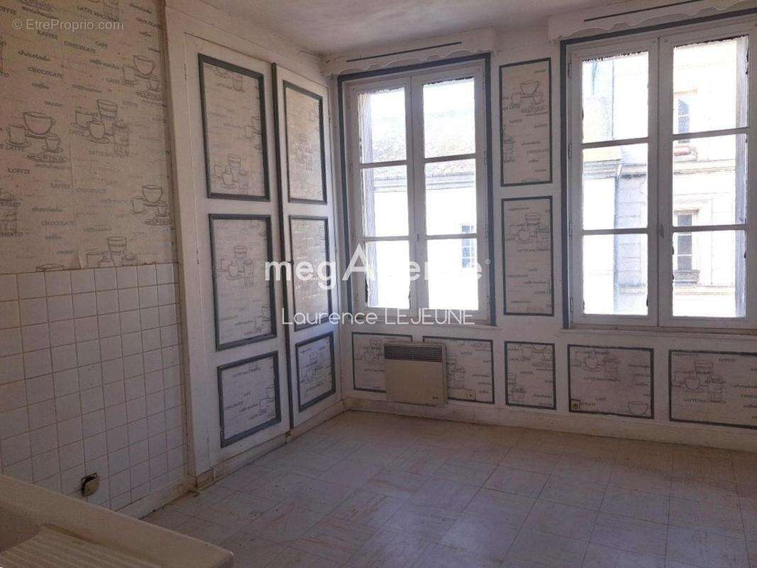 à ORBEC IMMEUBLE en monopropriété 7 appartements 1 boutique 1 local - photo 6