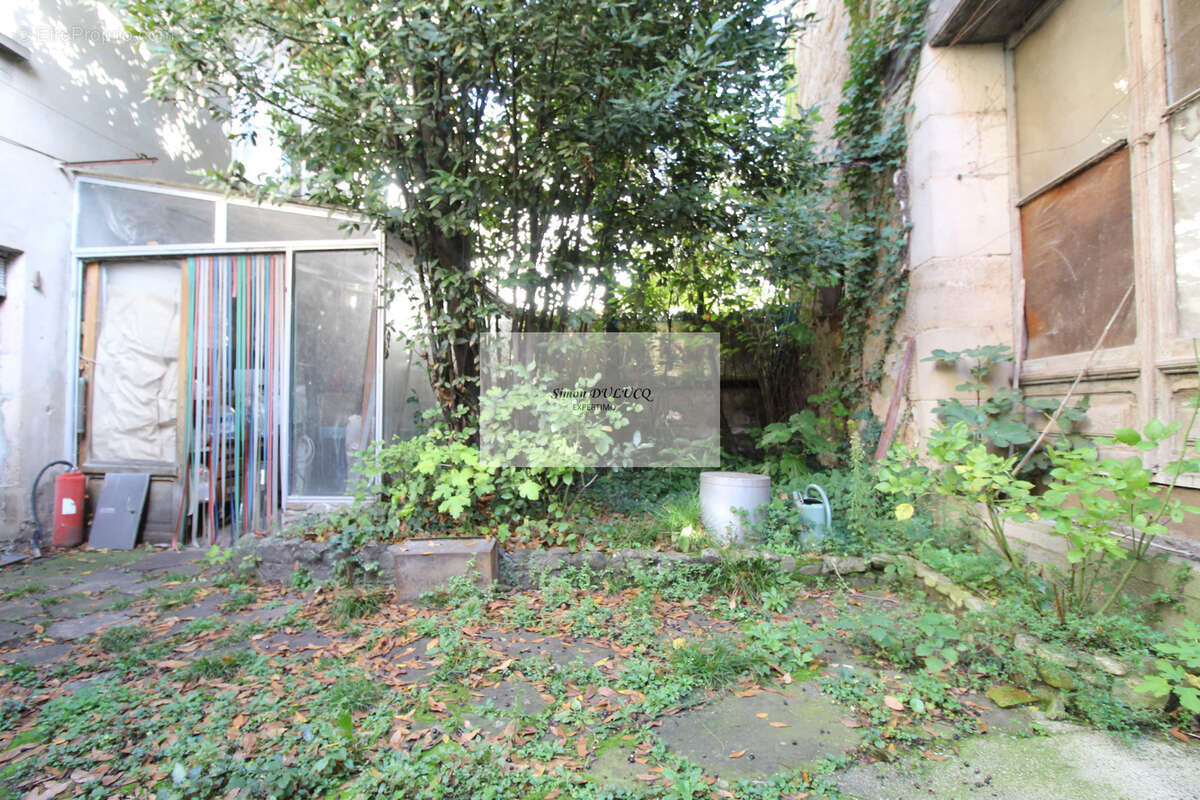 ENSEMBLE IMMOBILER : T4 ; T2 local commercial et grange - photo 12
