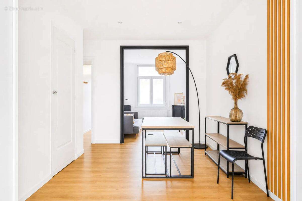Maison louée 5 pièces 97 m² à Tourcoing - photo 4