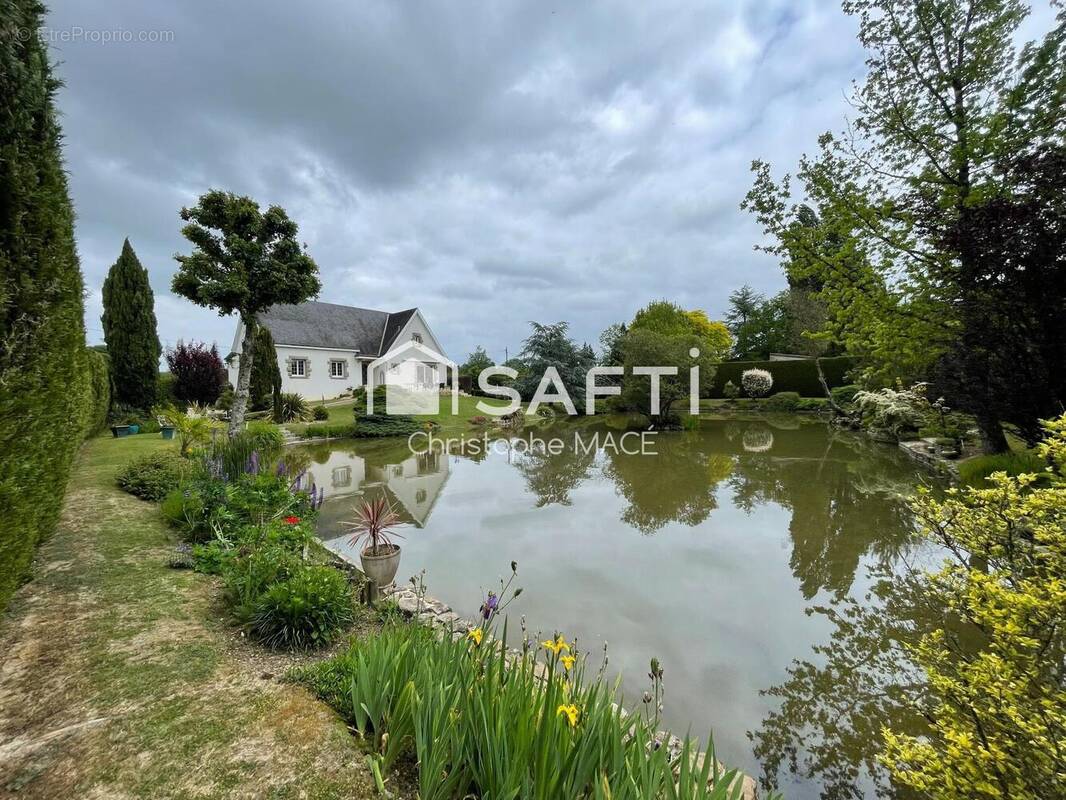 Photo 1 - Maison à LAVAL