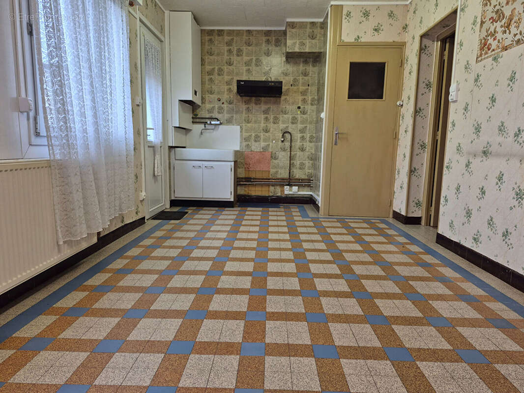 Maison à DOUCHY-LES-MINES