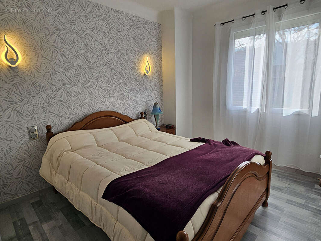 Maison en vie de plain-pied avec jardin et garage - photo 4