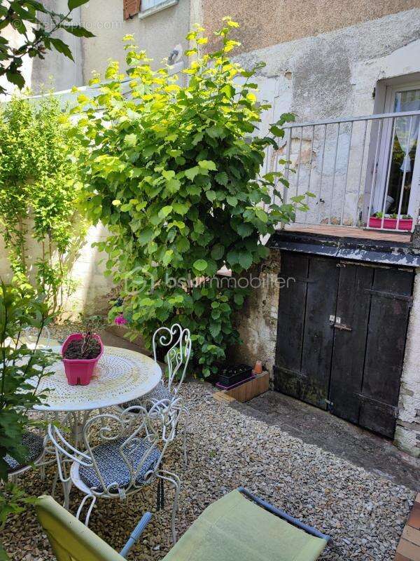Maison bourgeoise de 100 m² avec cave et extérieurs - photo 25