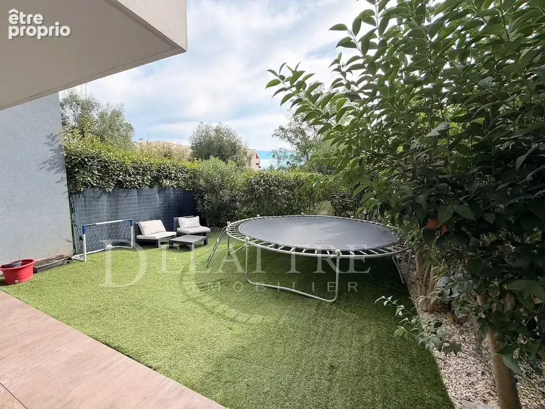 2 pièces rez-de-jardin avec piscine, garage et vue verdure - photo 5