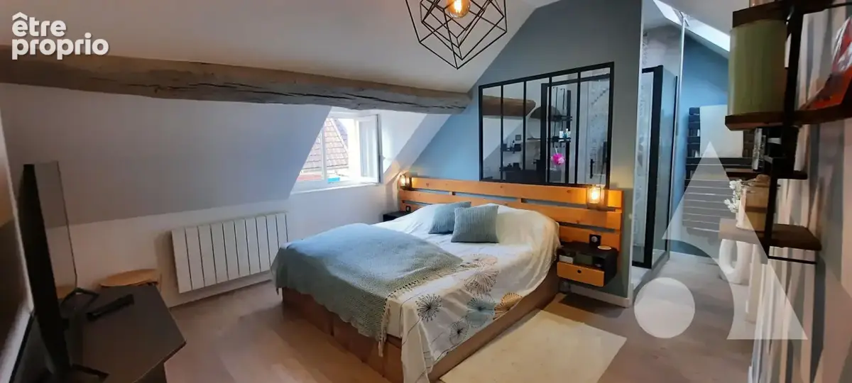 Ensemble immobilier comprenant un appartement de 118 m² avec terrasse et garage + un local commercial de 44 m² - photo 10