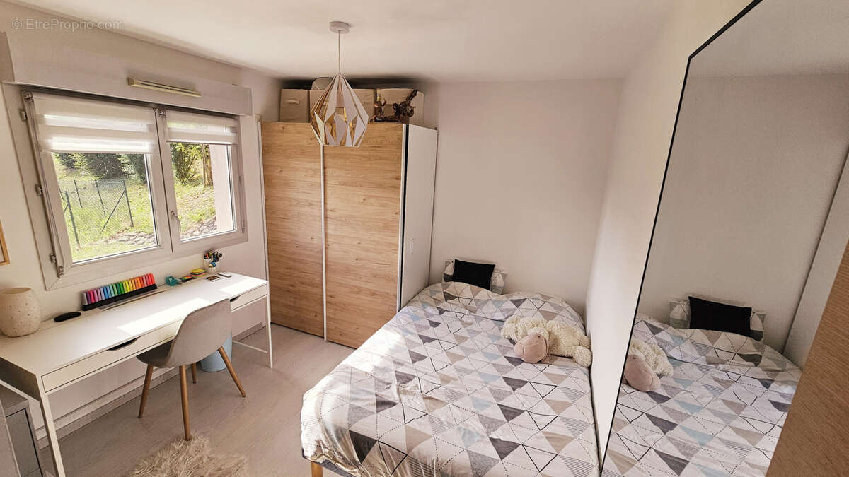 Magnifique T3  - 64 m2  avec Grande  Terrasse, cave aménagée et parking  à Groisy 74570 - photo 8