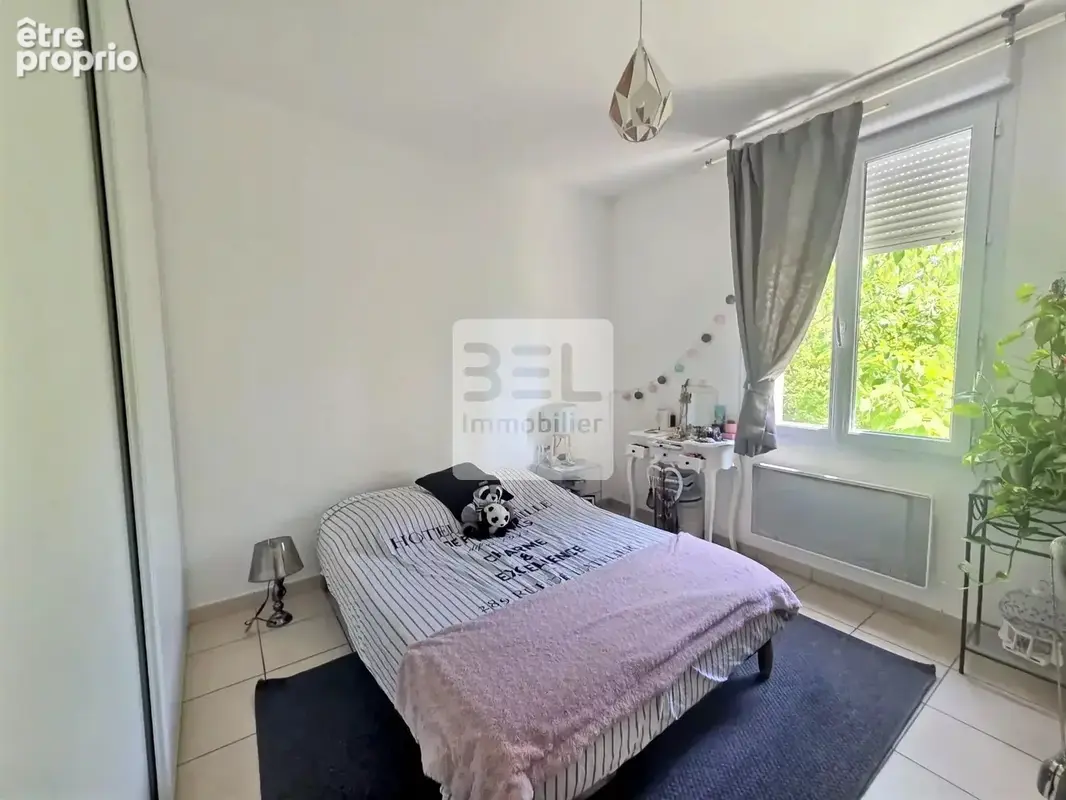 Maison avec 2 appartements a saint quentin la poterie - photo 10