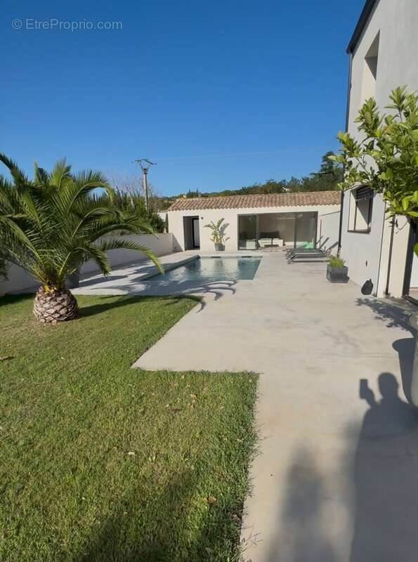 Maison à LAUDUN-L'ARDOISE