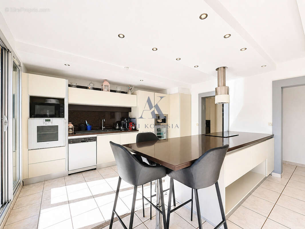 Décines-Charpieu   Appartement T4 95 m2 avec balcon et climatisation - photo 2
