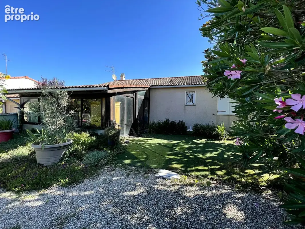A VENDRE Maison T4 de plain-pied avec véranda, garage. Terrain de 502 m² - photo 13