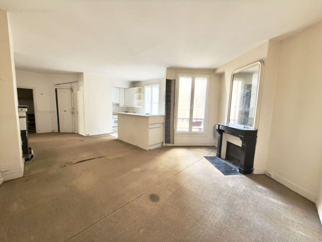 Appartement 60 m² à Paris-10e  - photo 4