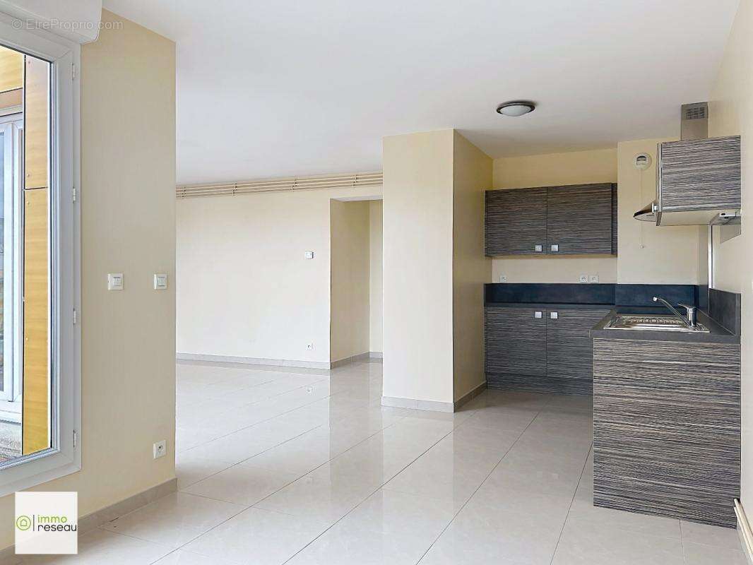 Appartement en résidence - photo 5