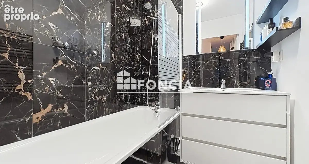 Beau t3 en rez de jardin en parfait etat - 2 parkings - cave - photo 5