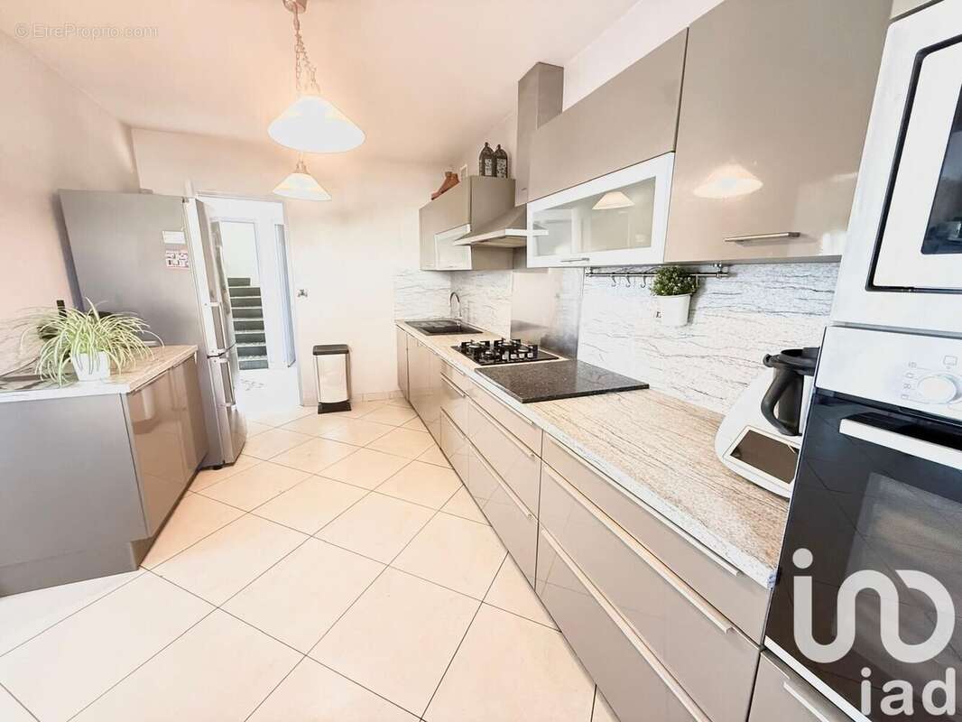 Photo 5 - Maison à CHANTELOUP-LES-VIGNES