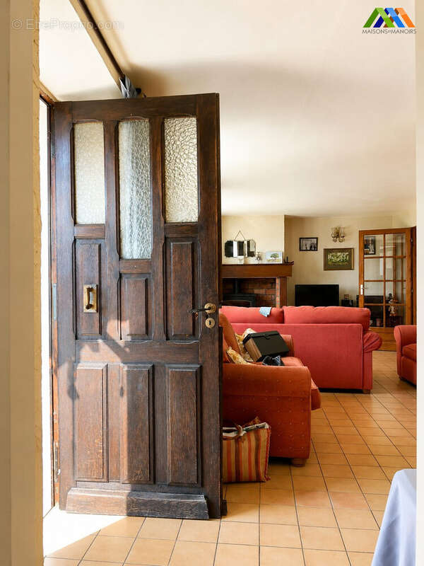 Welcoming living room through open door