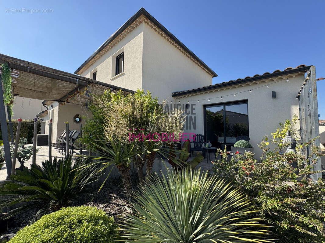 Maison à LAUDUN-L'ARDOISE