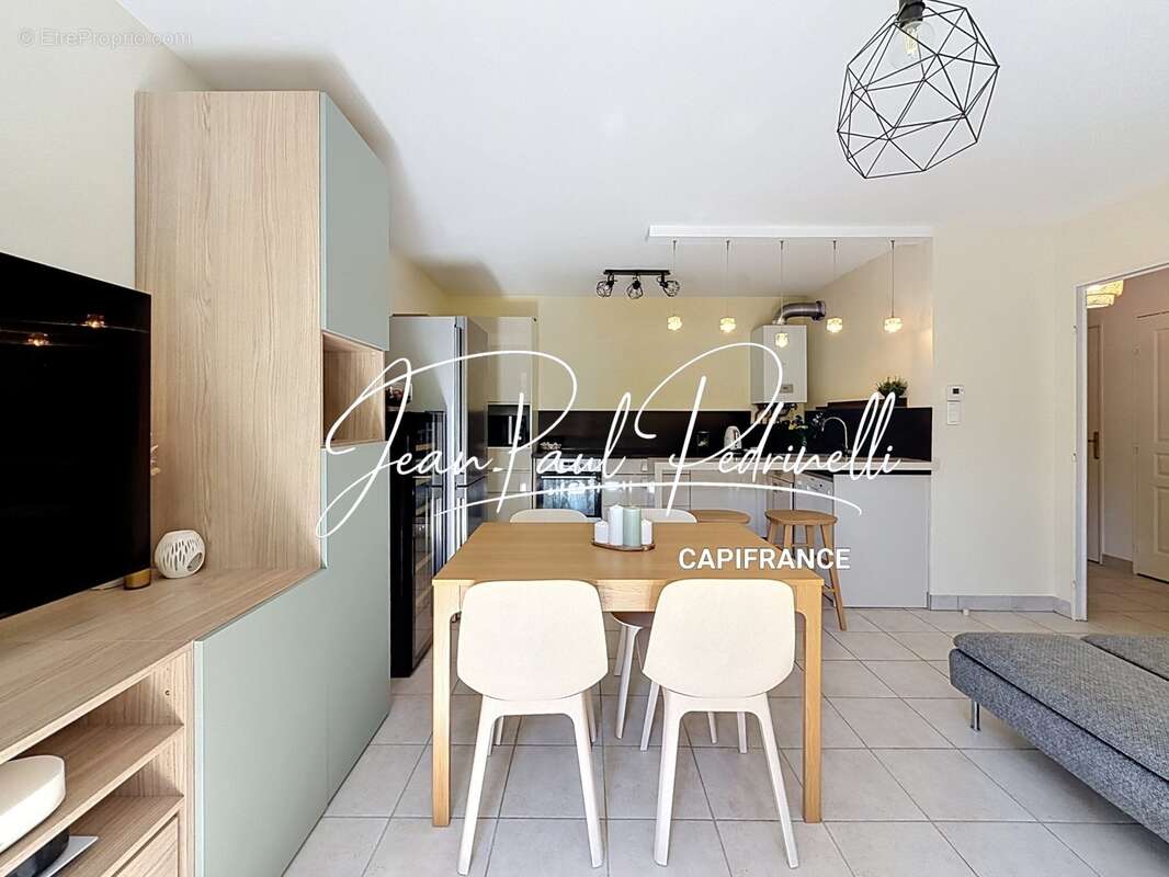 Tassin-la-Demi-Lune - Appartement 2 pièces de 48 m² avec balcon, parking privatif et cave - résidence sécurisée récente - photo 9