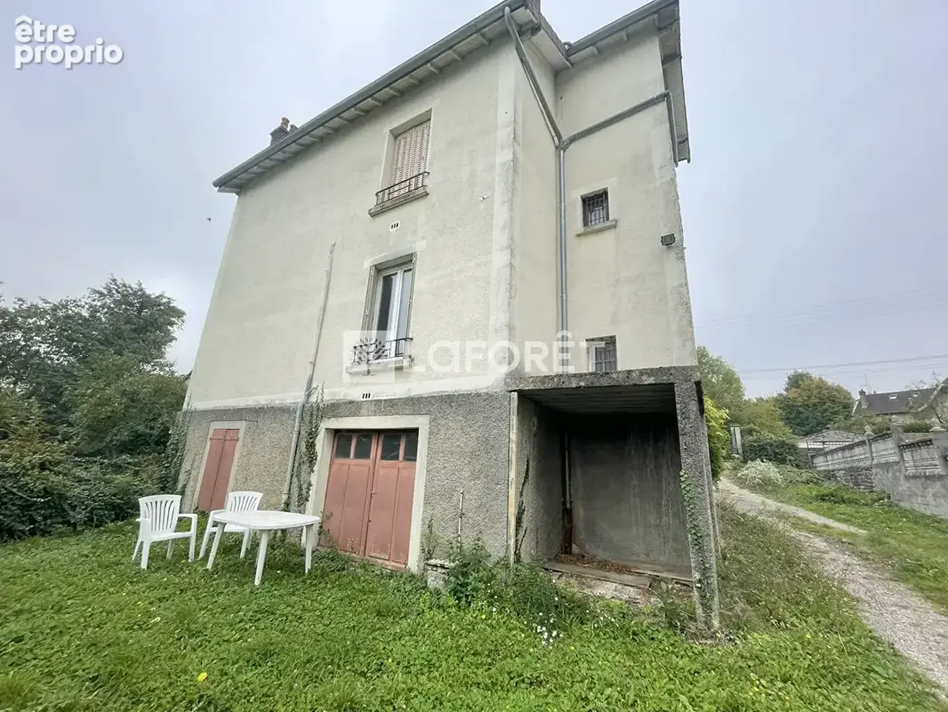 Lons-le-Saunier · Maison de caractère en pierre · 2 logements indépendants · Jardin 770 m² · Idéal investissement ou famille - photo 2