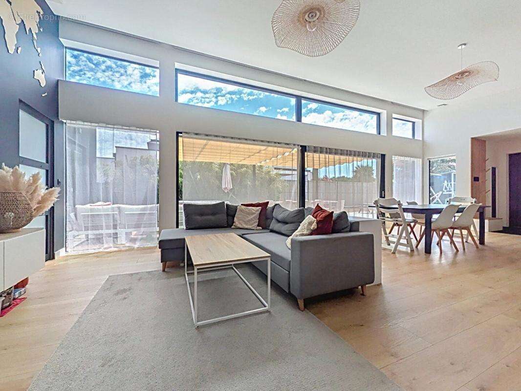 Maison de 150 m² aux performances passives - Un confort de vie exceptionnel au coeur de la nature - photo 7