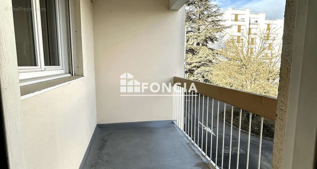 Appartement  T5– Quartier Gazonfier, balcon, stationnement facile - photo 3