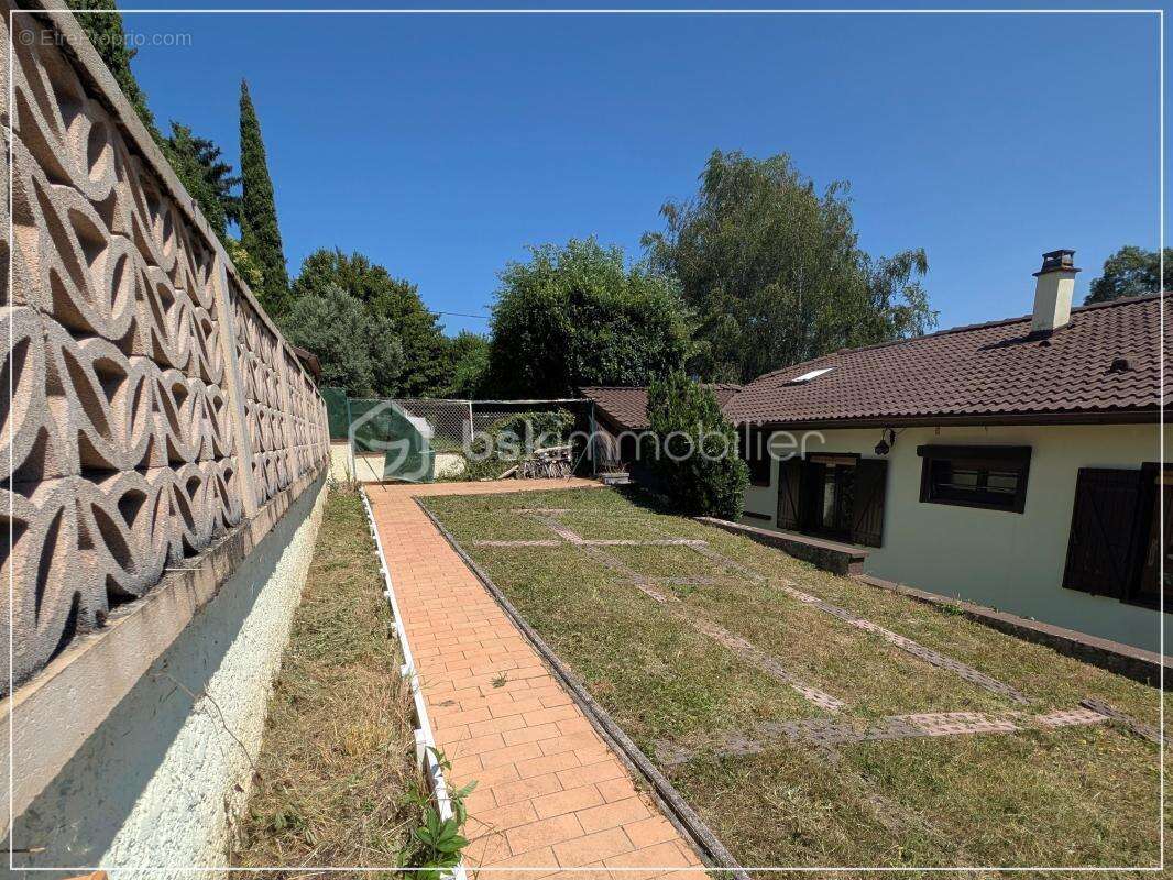 Maison de plain-pied avec garage sur terrain clos de 770 m² - photo 5