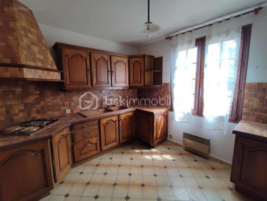 Maison de 113 m² sur sous sol et grenier aménageable sur 445 m² de parcelle - photo 11